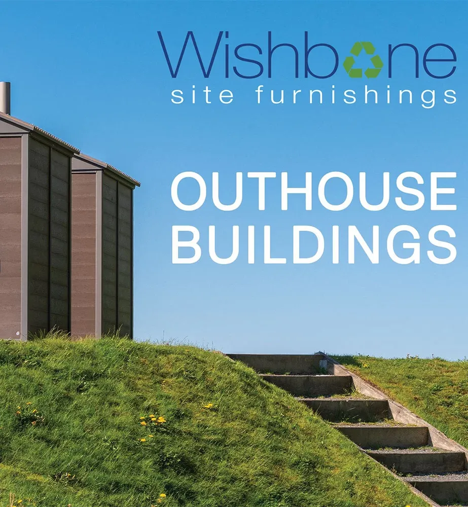 Outhouse buildings made with durable materials provide essential facilities in outdoor locations. These structures offer privacy and protection for users.