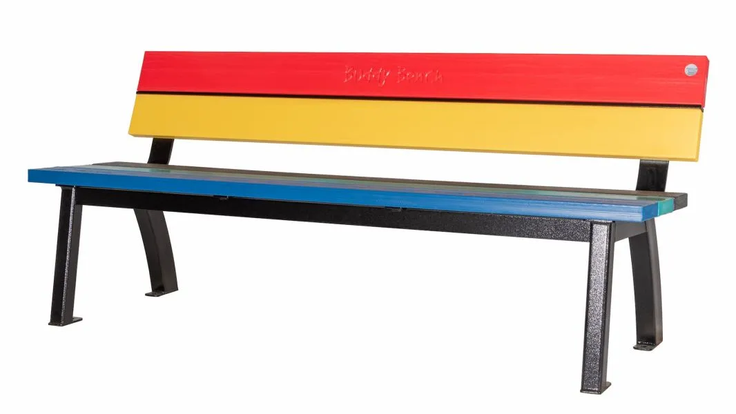 Aylesbury Buddy Bench with a black frame and colorful recycled plastic lumber slats. The backrest features red and yellow slats, while the seat has a mix of blue, green, and black.