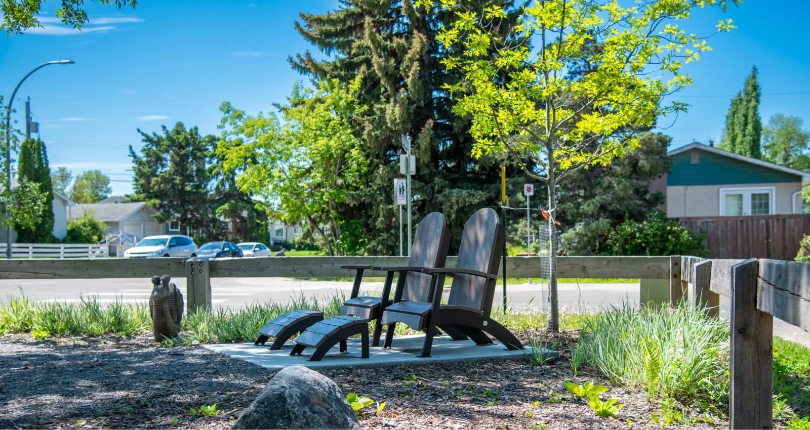 Okanagan Lounge Chairs with footrests create a relaxing outdoor seating area. These durable recycled plastic chairs are perfect for enjoying a park or garden setting.