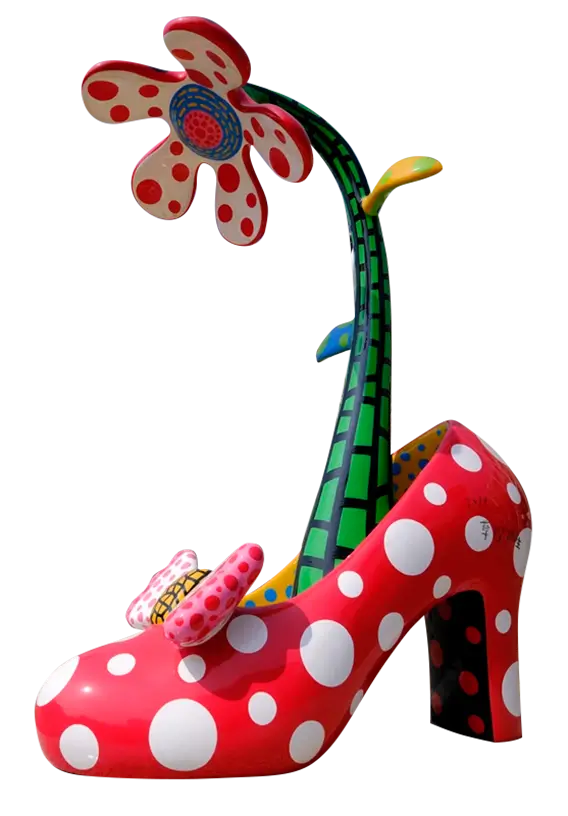 Colourful sculpture of a flower emerging from a high heeled shoe