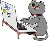 Gif of a cat typing on a laptop