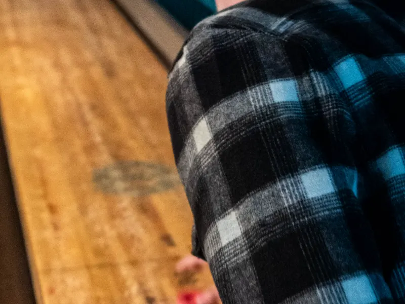 Group playing shuffleboard at Work-Work