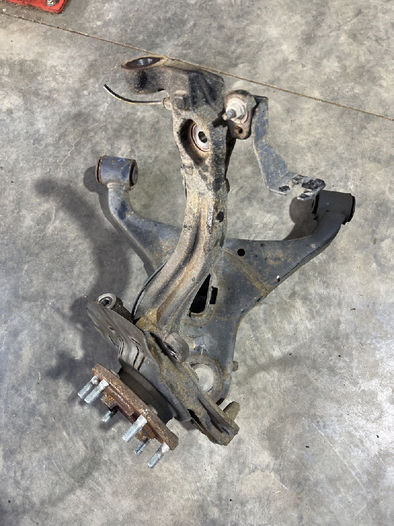 KNUCKLE - STUB AXLE with bearing and lower control arm LEFT LHF