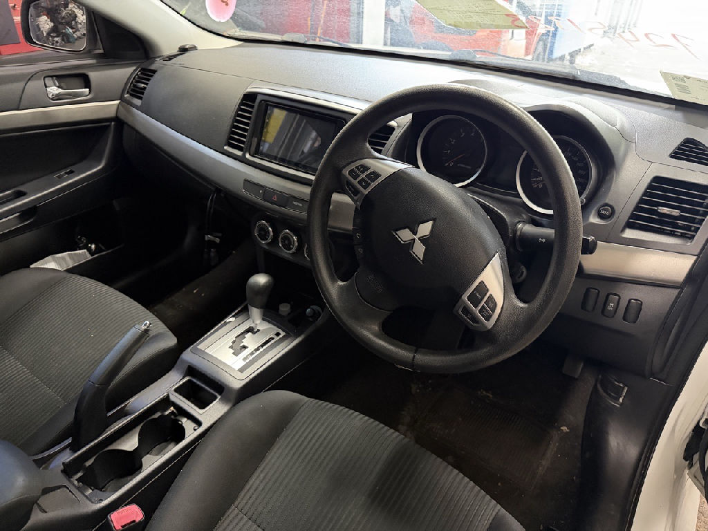 CJ 2014 Mitsubishi Lancer photo 5