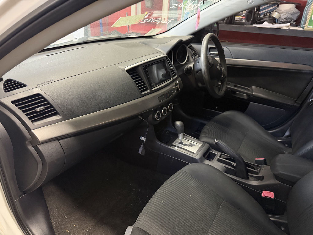 CJ 2014 Mitsubishi Lancer photo 7