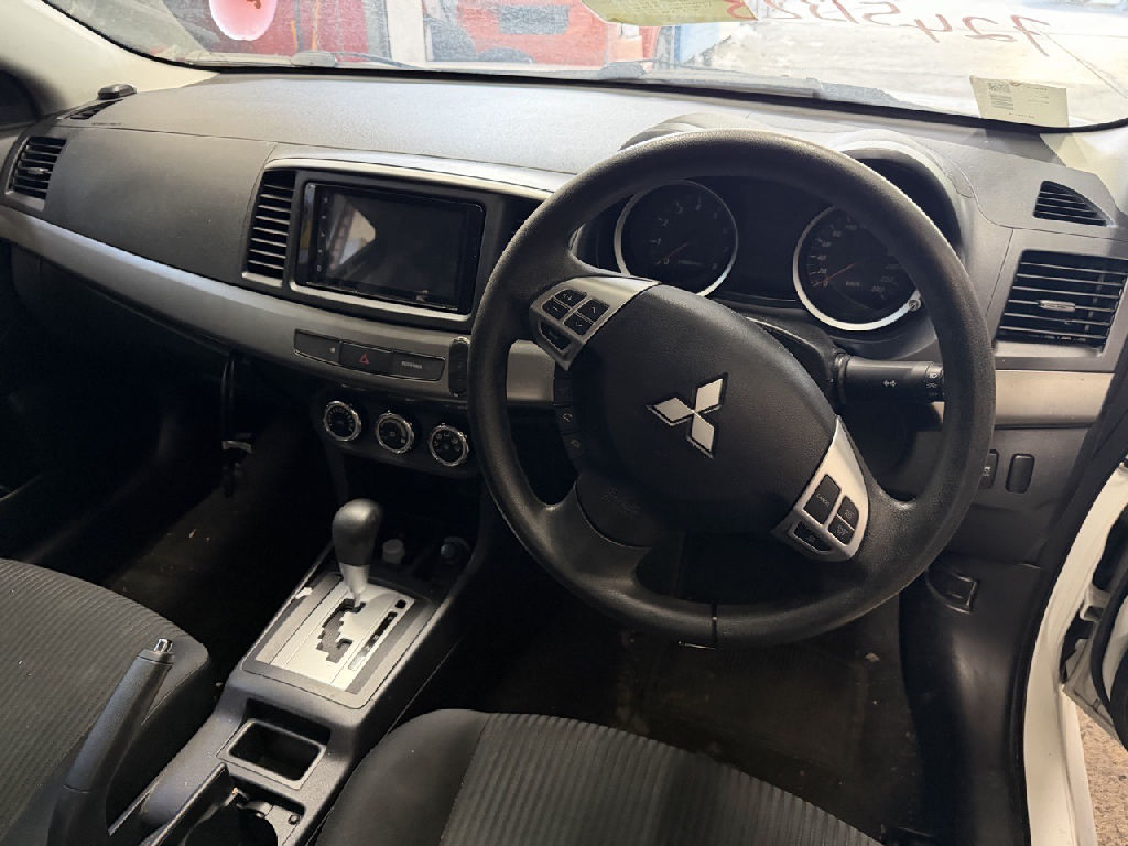 CJ 2014 Mitsubishi Lancer photo 10