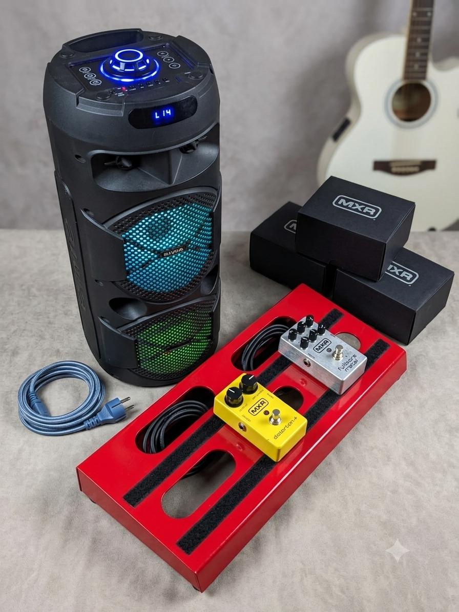 Pedalera con pedales de efectos y parlante Aiwa portátil