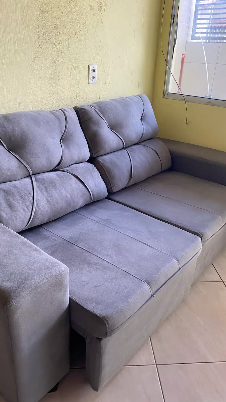 Sofá beige de 2 cuerpos