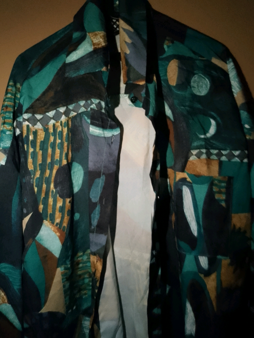 Large patterned green shirt