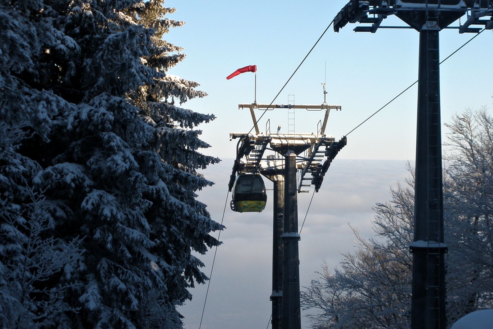 Wagon reaching the top station in winter