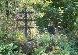 Cross standing in the old church cemetery
