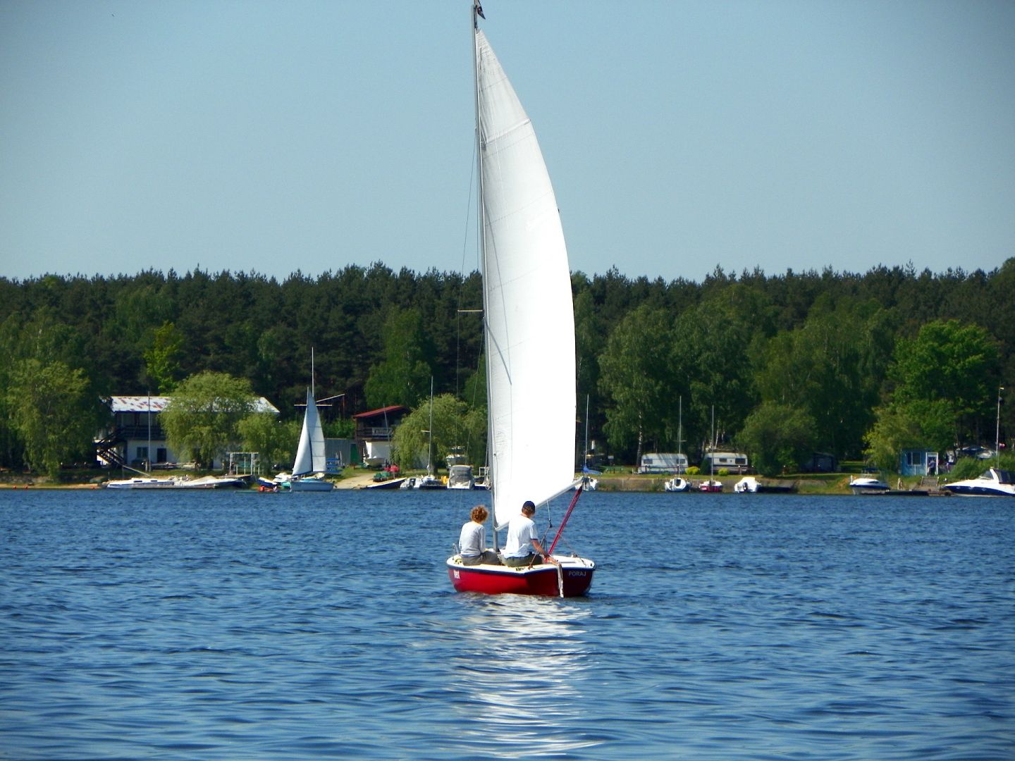 sailboat through the lagoon