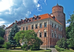 Panorama of the Uniejów Castle in summer