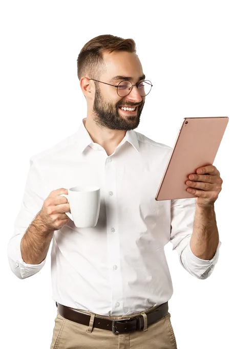 Hands on a laptop with blog editor and performance charts—representing SEO and AI-discoverable blog content