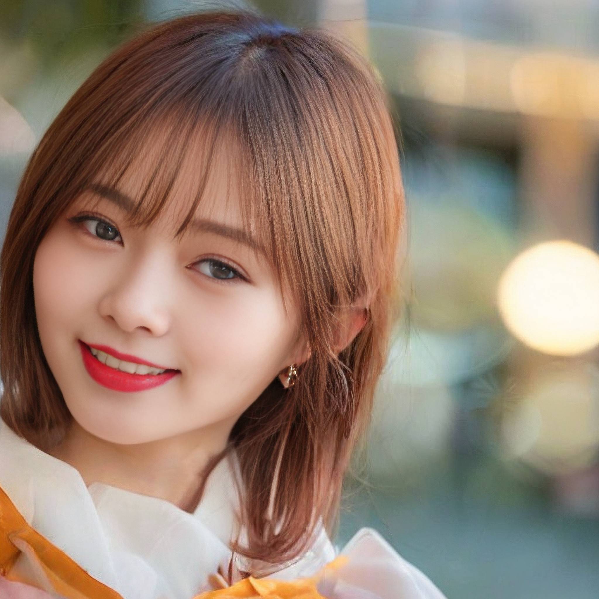 a young woman in a dress with a bow tie 