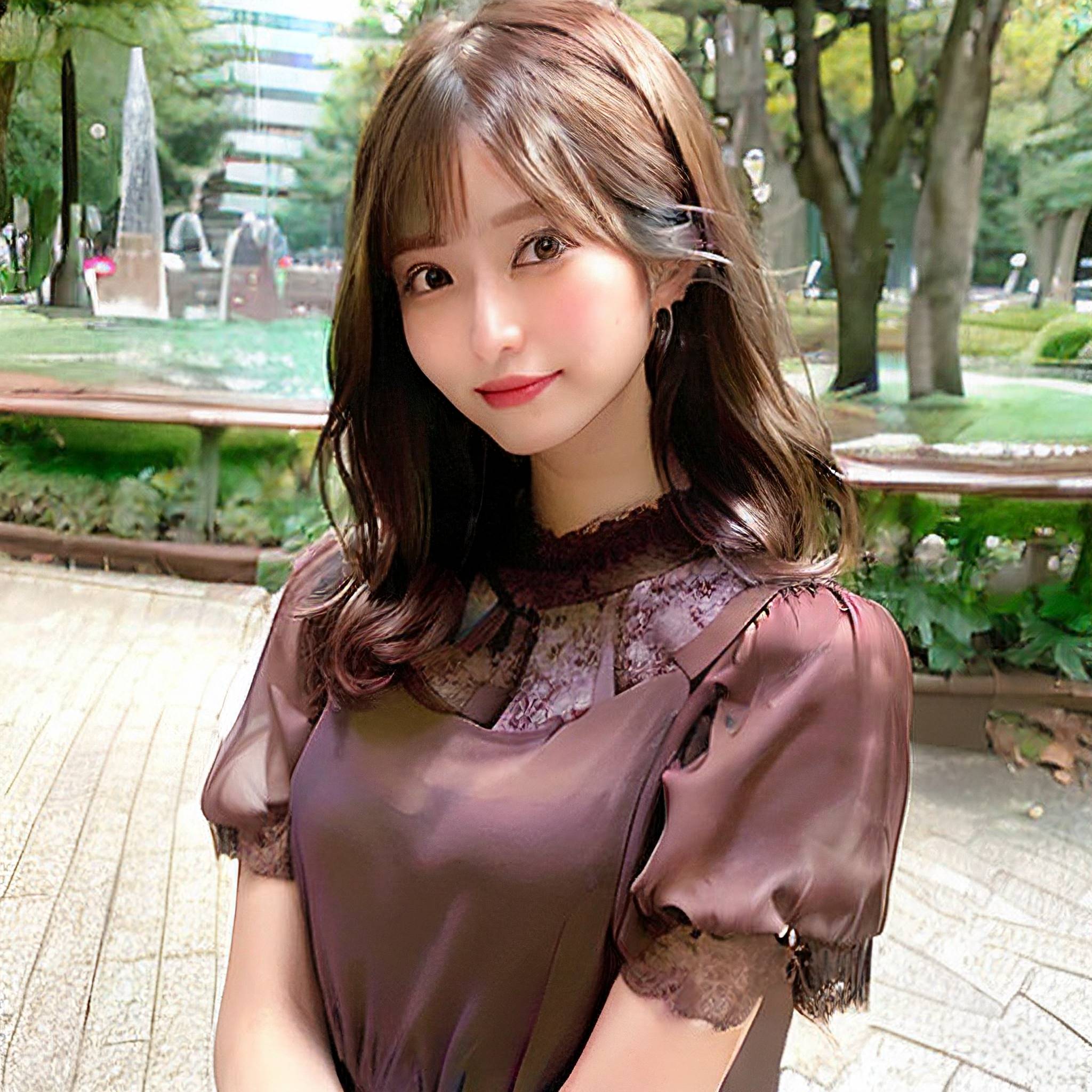 a young girl posing for a picture in a park 