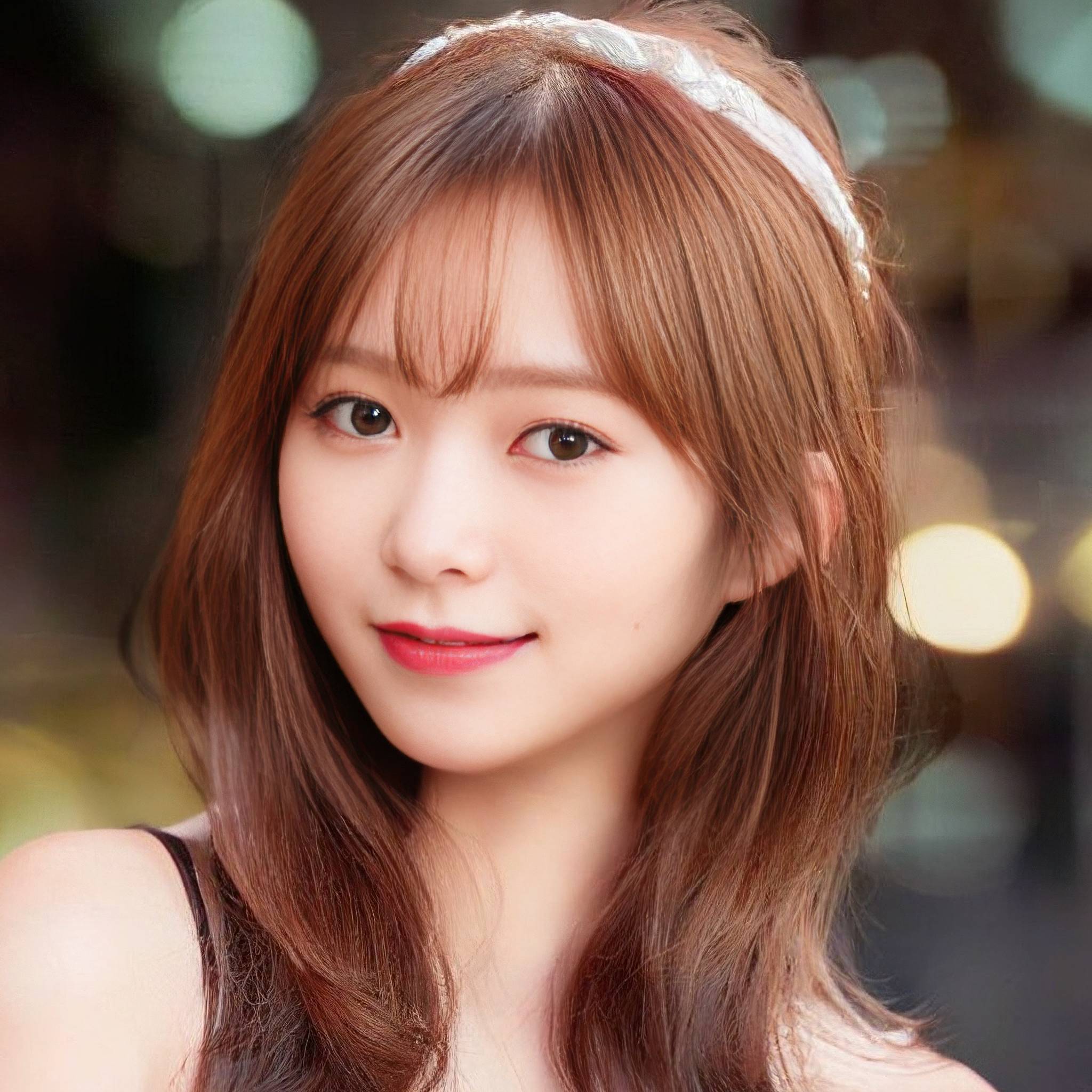 a beautiful young woman in a pink dress posing for a picture 