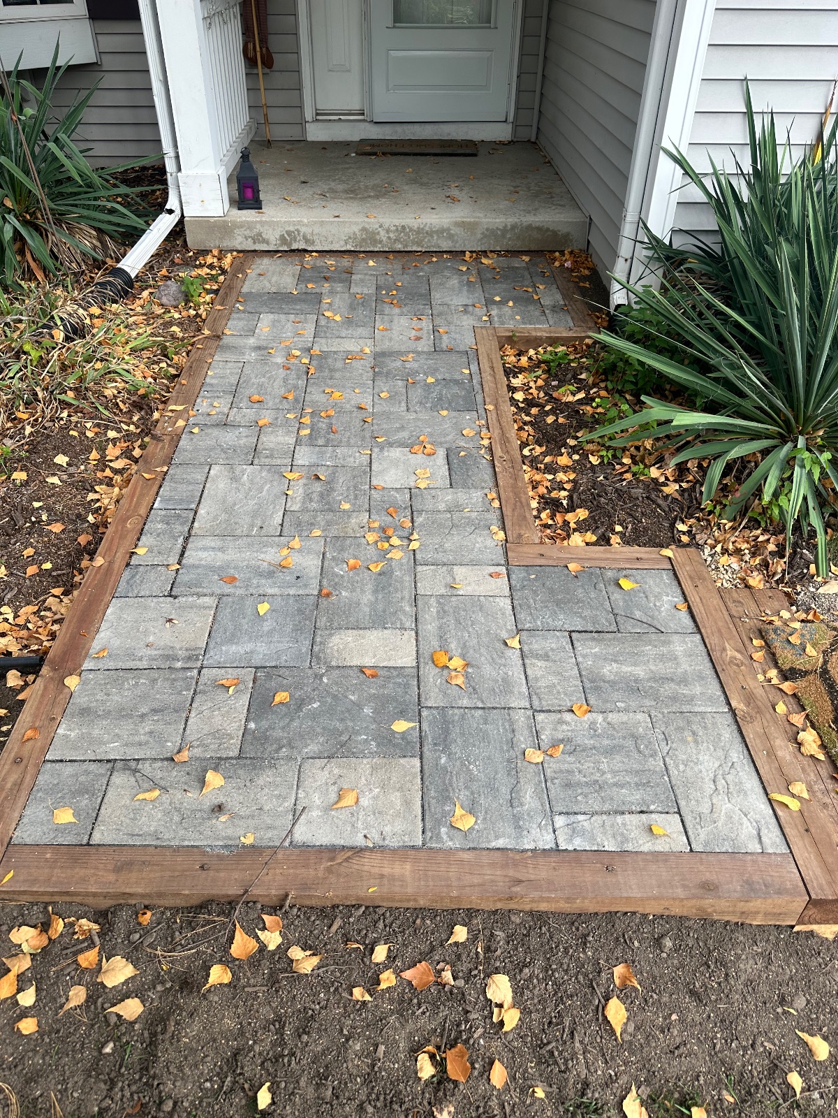 Paver front walk with a timber border near Middleton, WI