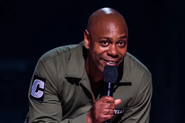 Dave Chappelle performing stand-up comedy