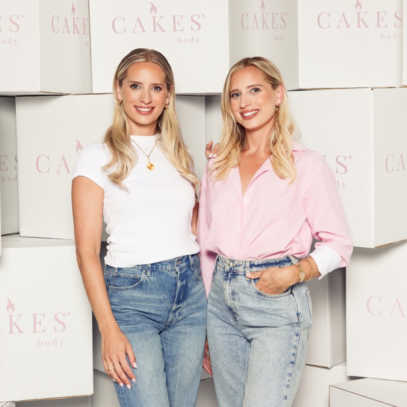 Taylor Capuano, co-founder of CAKES body, with her twin sister and co-founder Casey Sarai