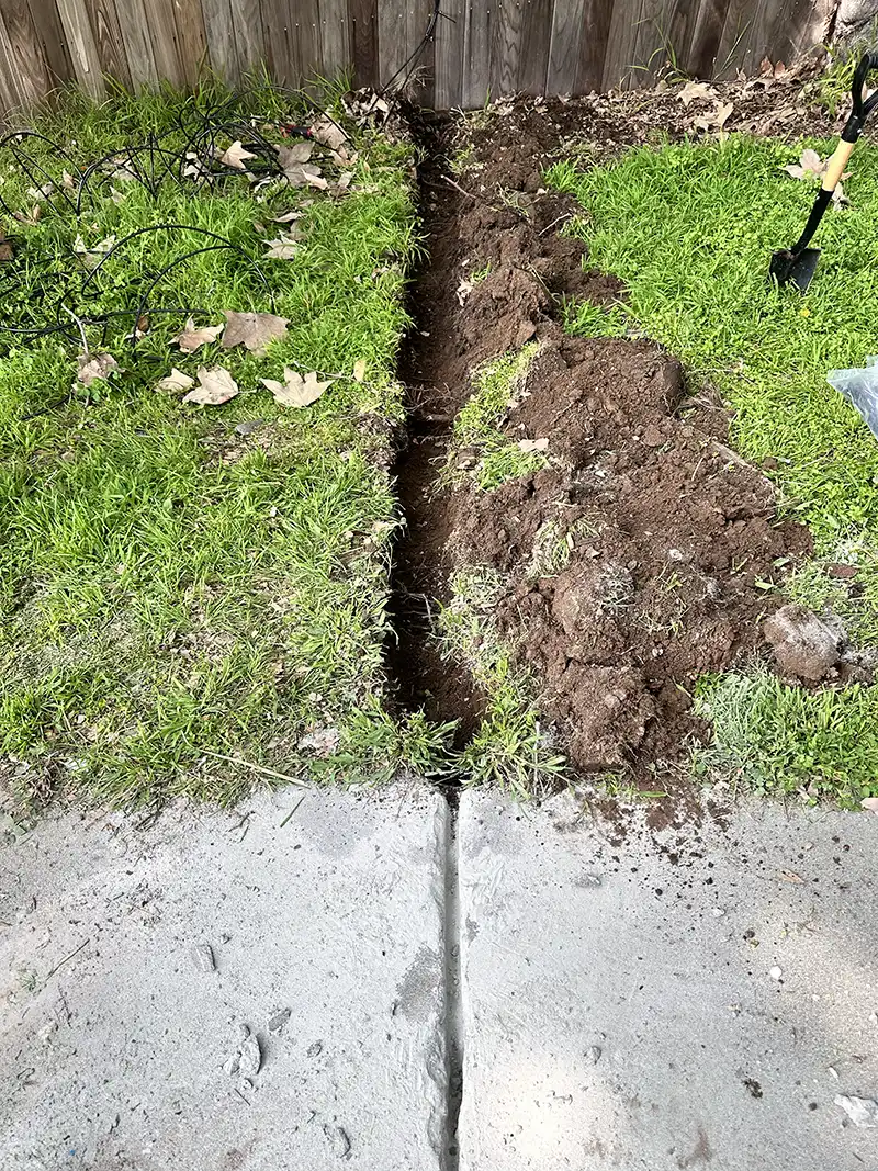 Digging trench for ethernet cable.