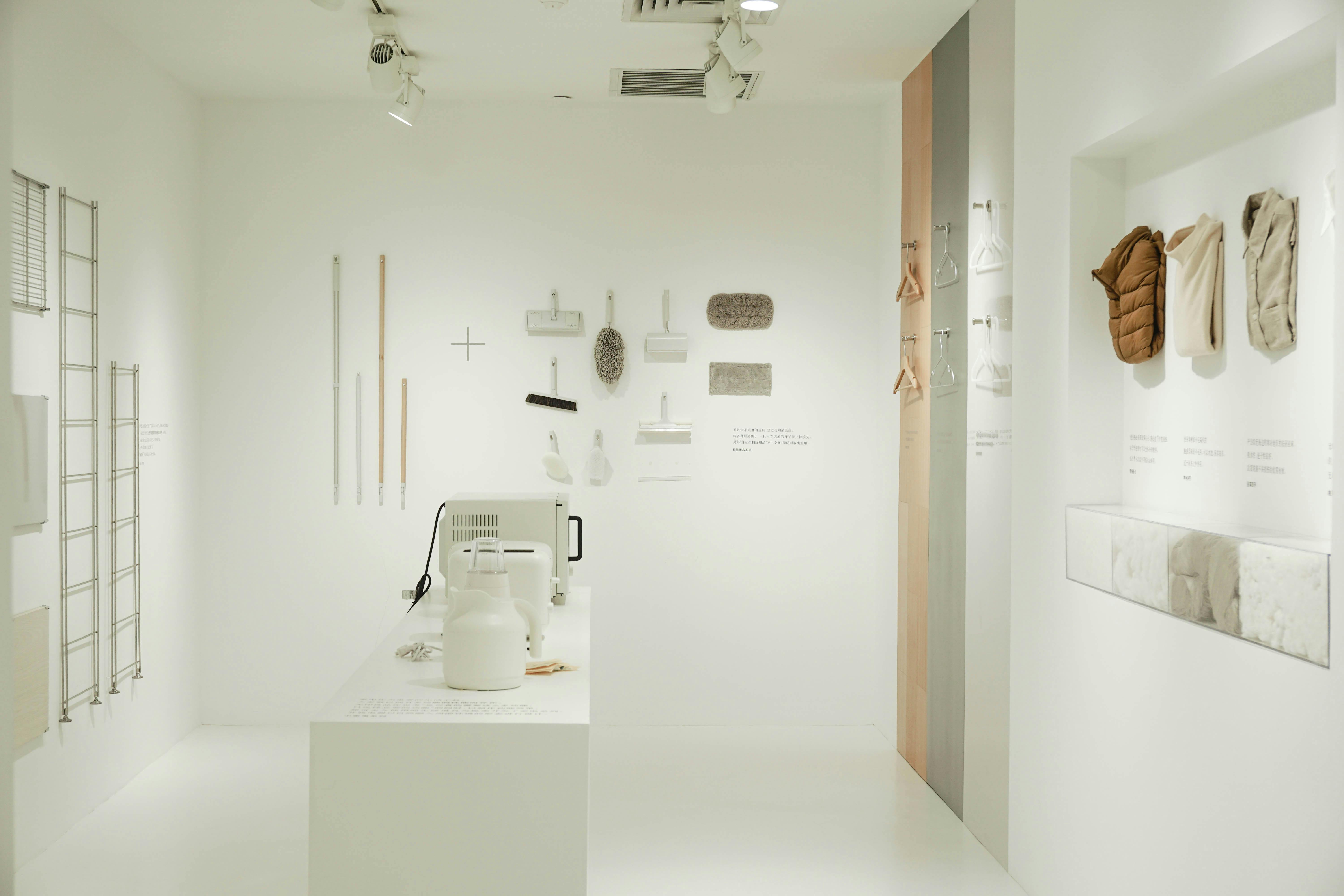 An overview of a winter renovation project in progress, showing a home interior with exposed insulation being installed in the walls and ceiling. Tool