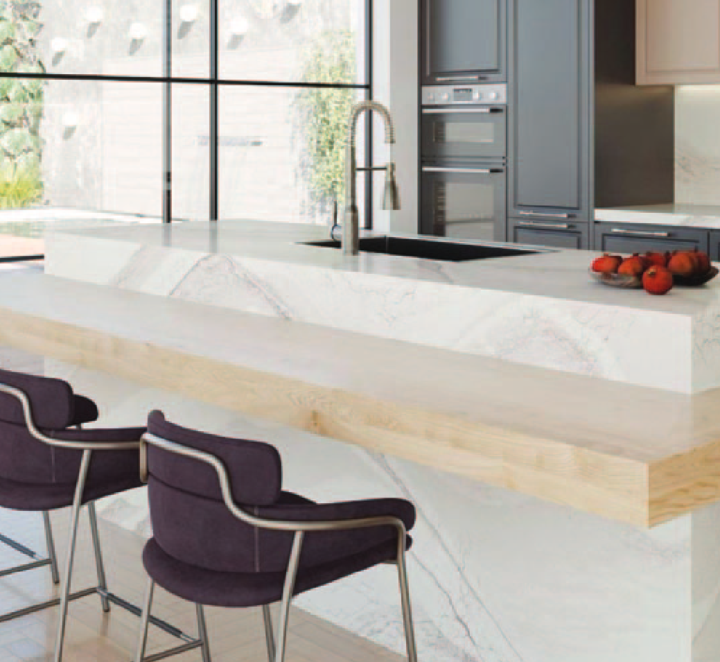 Modern kitchen with a marble countertop and sleek design.