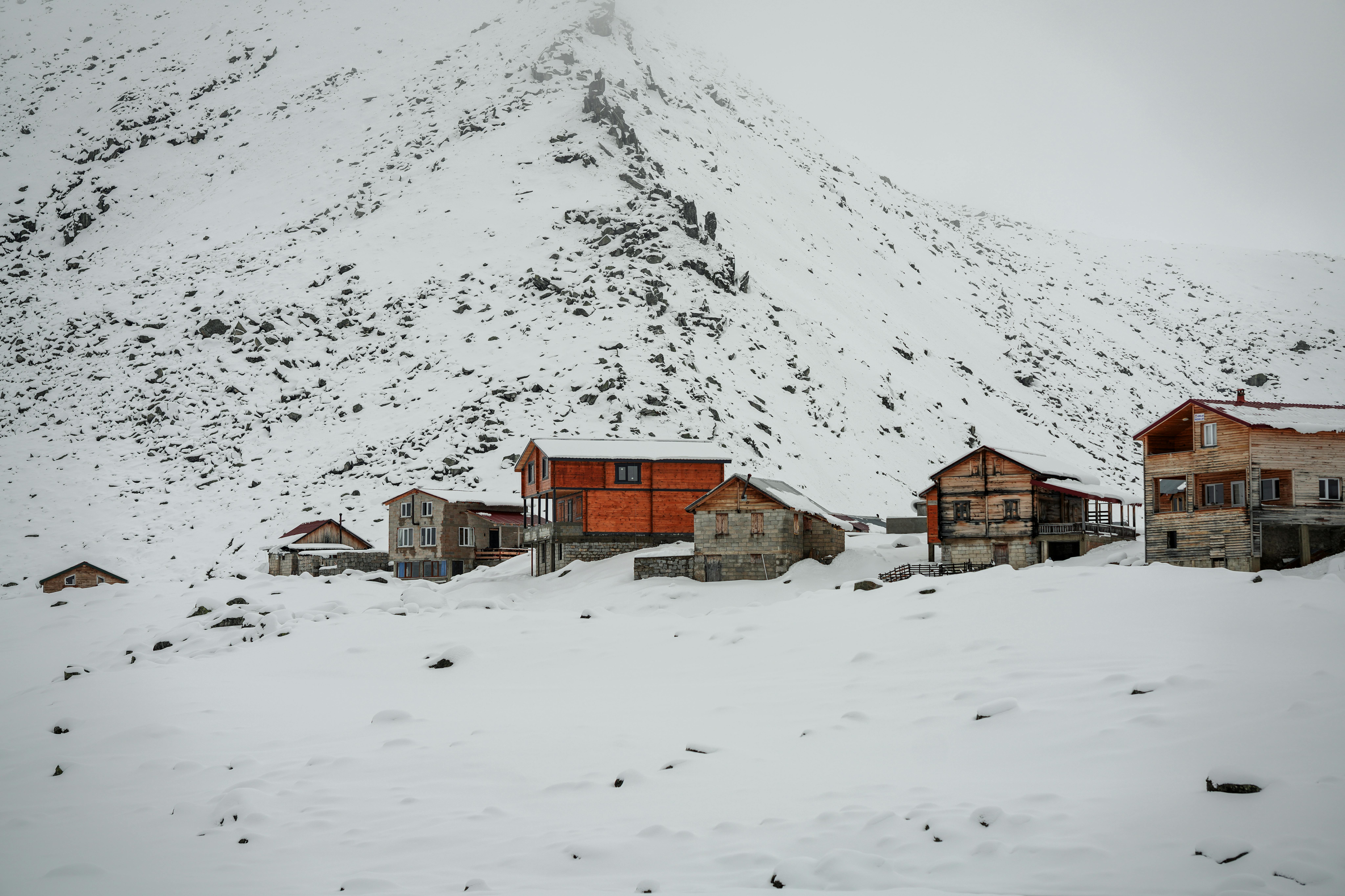 An infographic illustrating the impact of extreme winter weather on a home, including icons or visual elements representing heating system failures, f