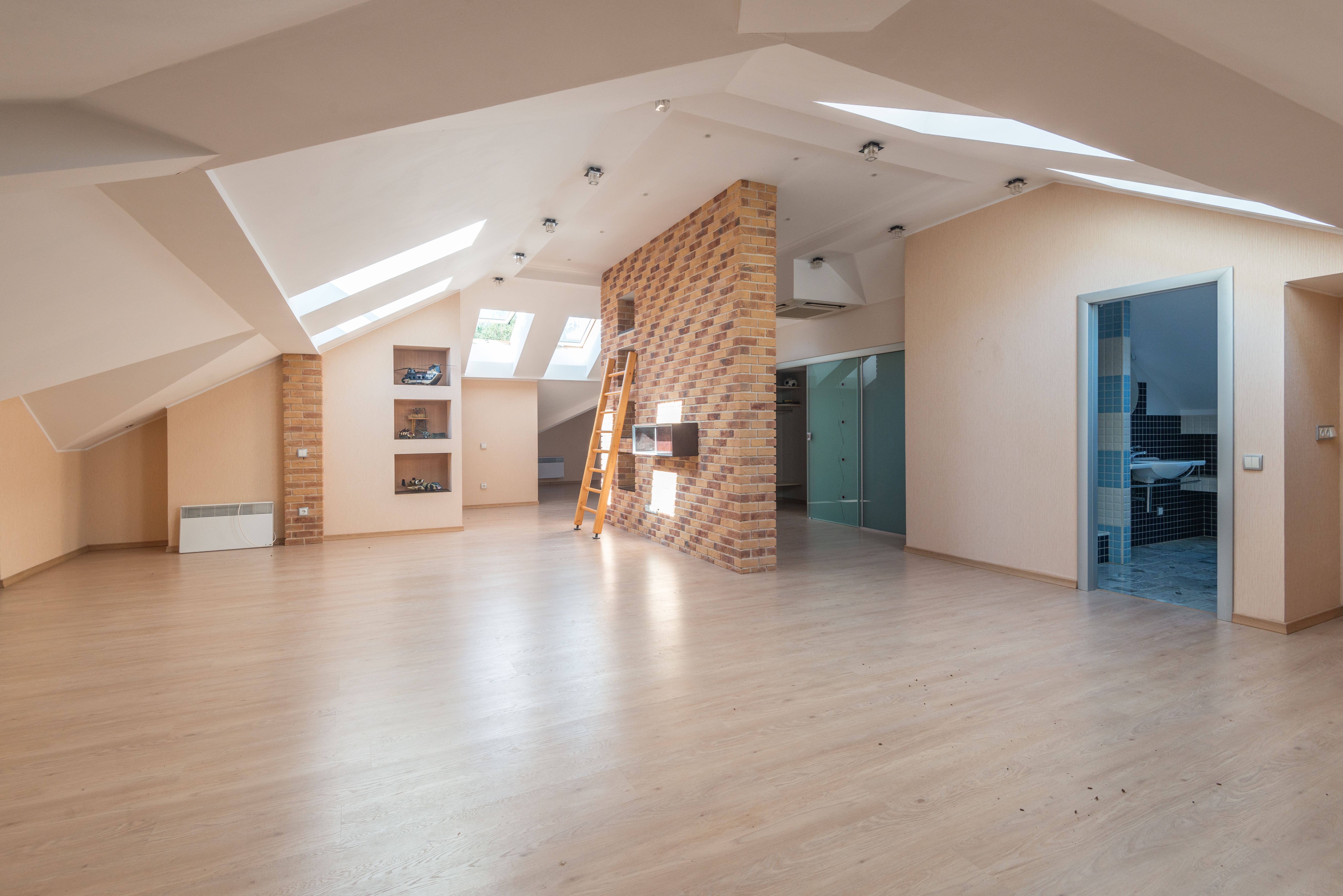 An infographic style image displaying the cost breakdown of attic conversions, highlighting key factors such as size, complexity, and location, with v