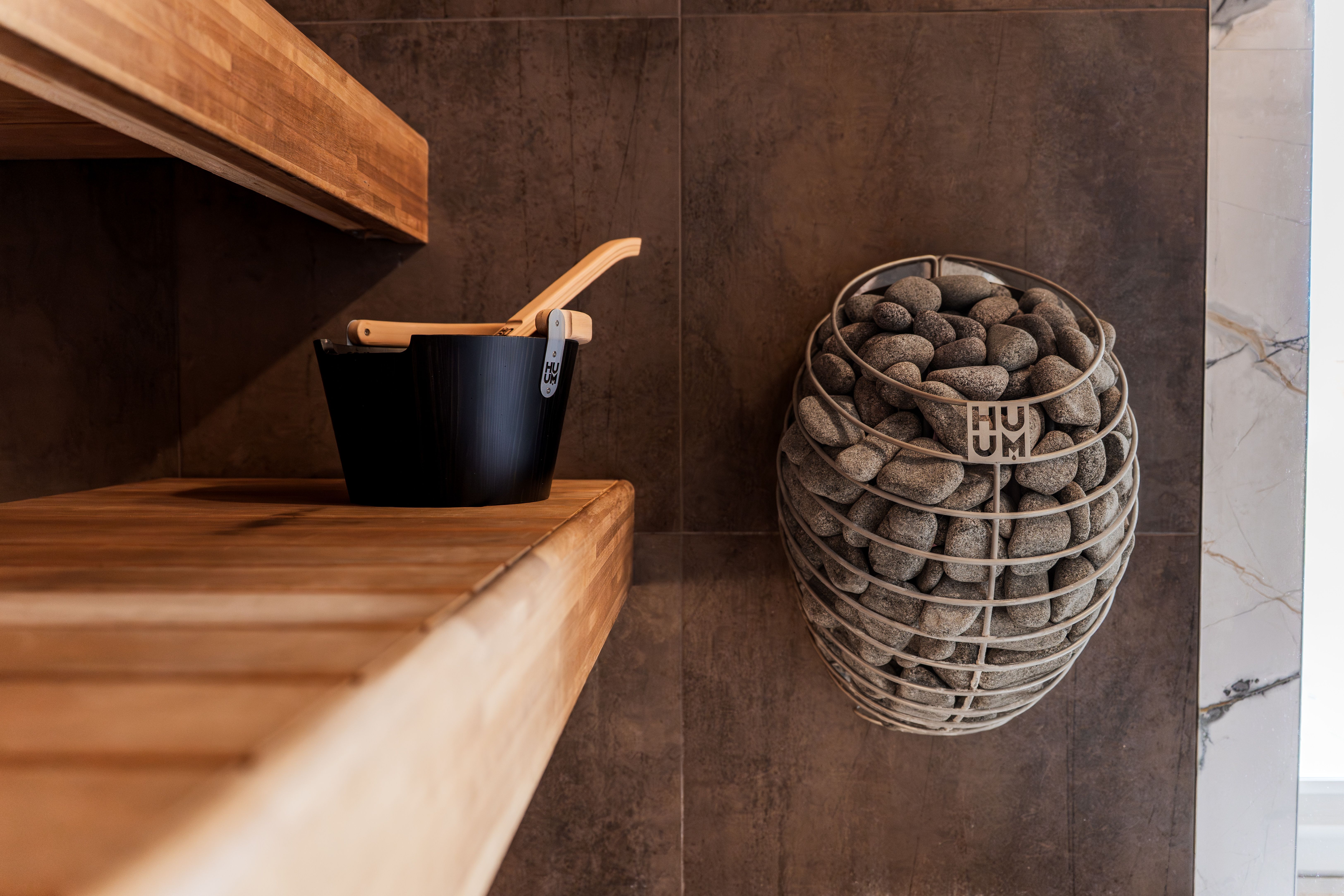 A modern mudroom integrated with smart home technology, featuring smart lighting, automated storage systems, and eco-friendly materials. The design sh