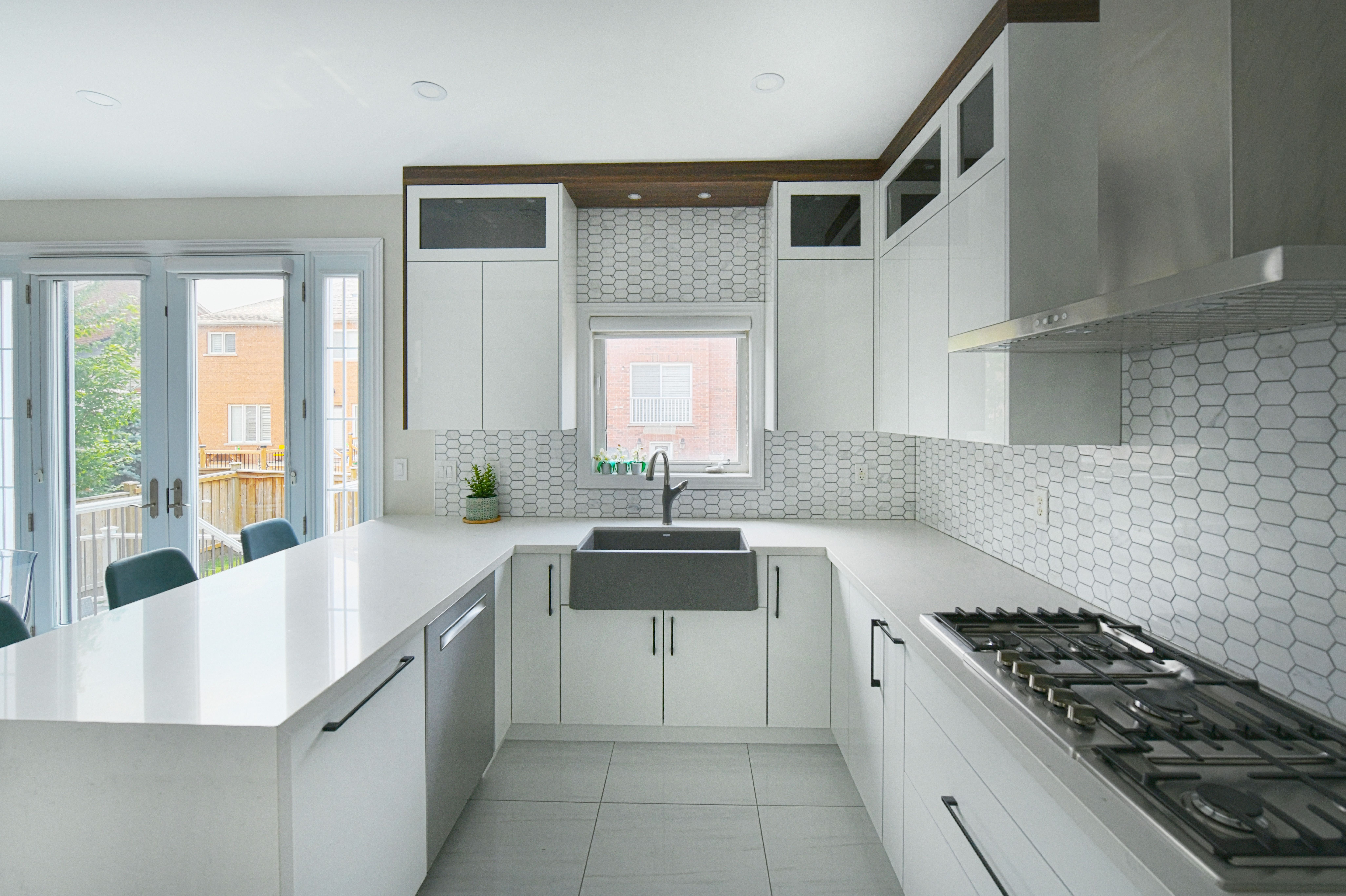 A detailed image of eco-friendly kitchen backsplashes featuring recycled glass and reclaimed wood, highlighting their textures and colors in a contemp