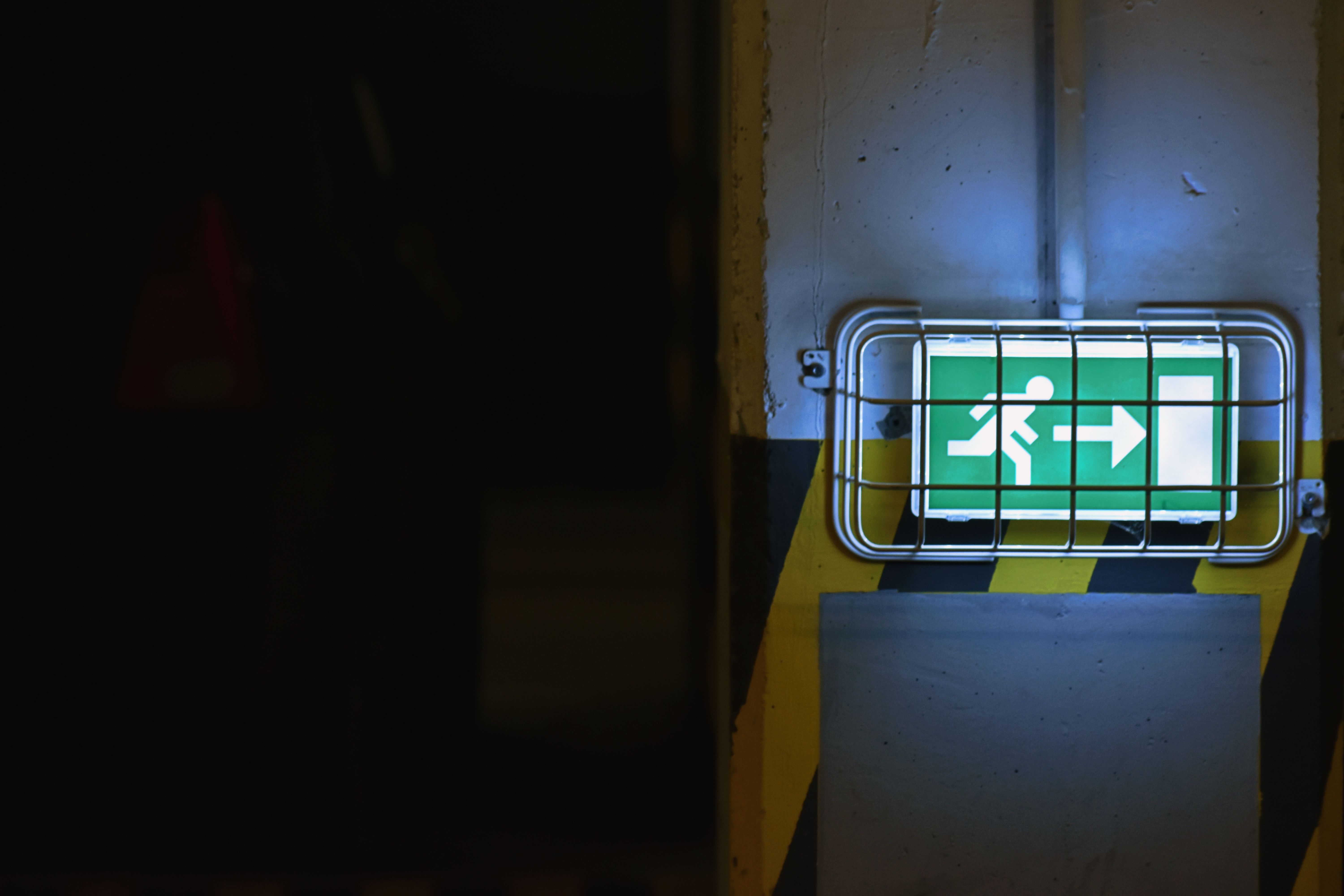 A well-lit walkway in a residential area at night, focusing on safety and aesthetic lighting. The image includes pathway lights that ensure visibility