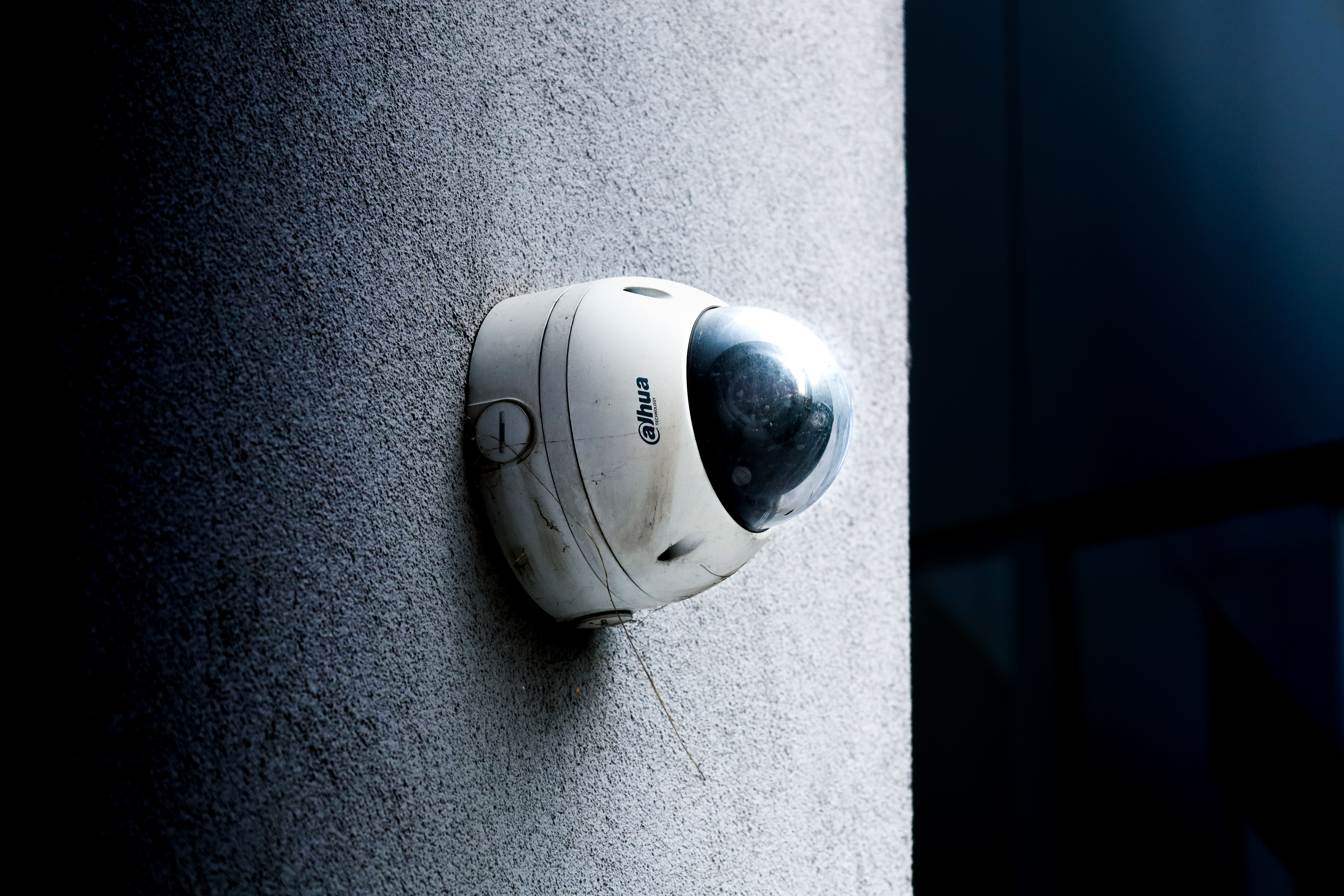 A picturesque Lehigh Valley home exterior with weatherproof smart security cameras installed, blending seamlessly with Colonial or Victorian architect