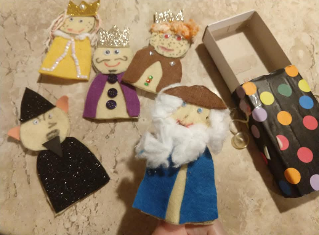 Finger puppets in a match box