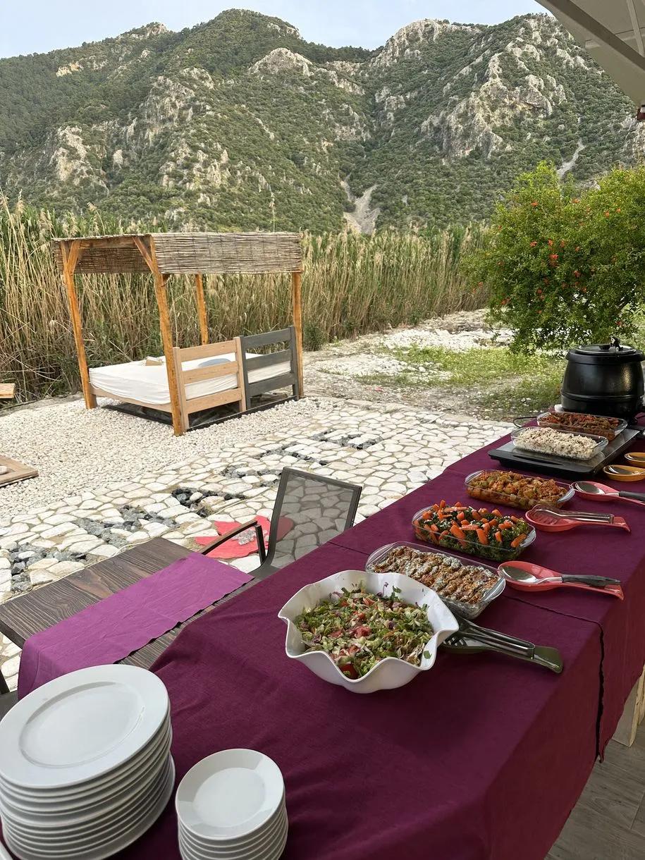 A shared meal overlooking the mountains