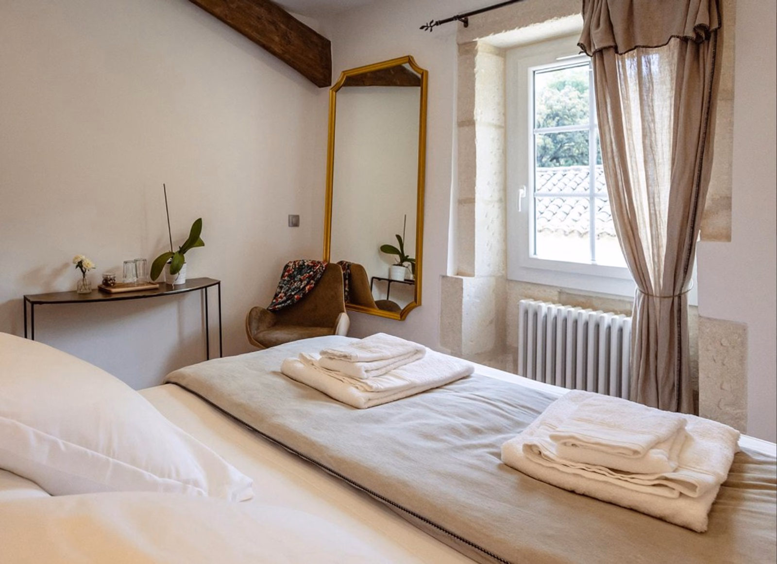 Guest bedroom with king bed in the main farmhouse