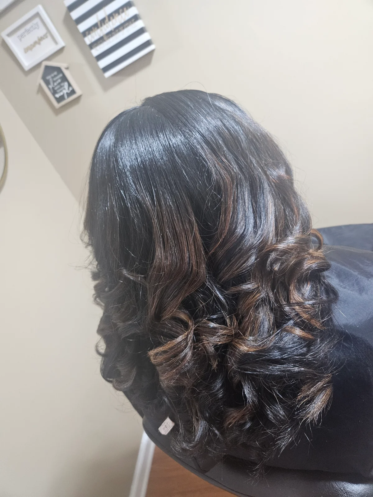 Blow out with a flat iron for a smooth and  sleek finish.