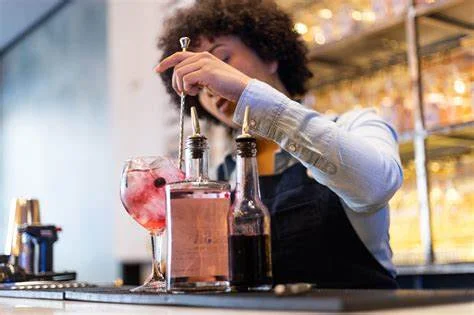 The Impact of Professional Bartenders and Servers: Elevating Your Event Experience