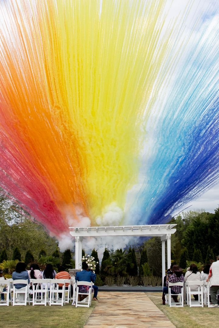Elevate Your Wedding with Daytime Firework Color Release: The Unforgettable Kiss Moment