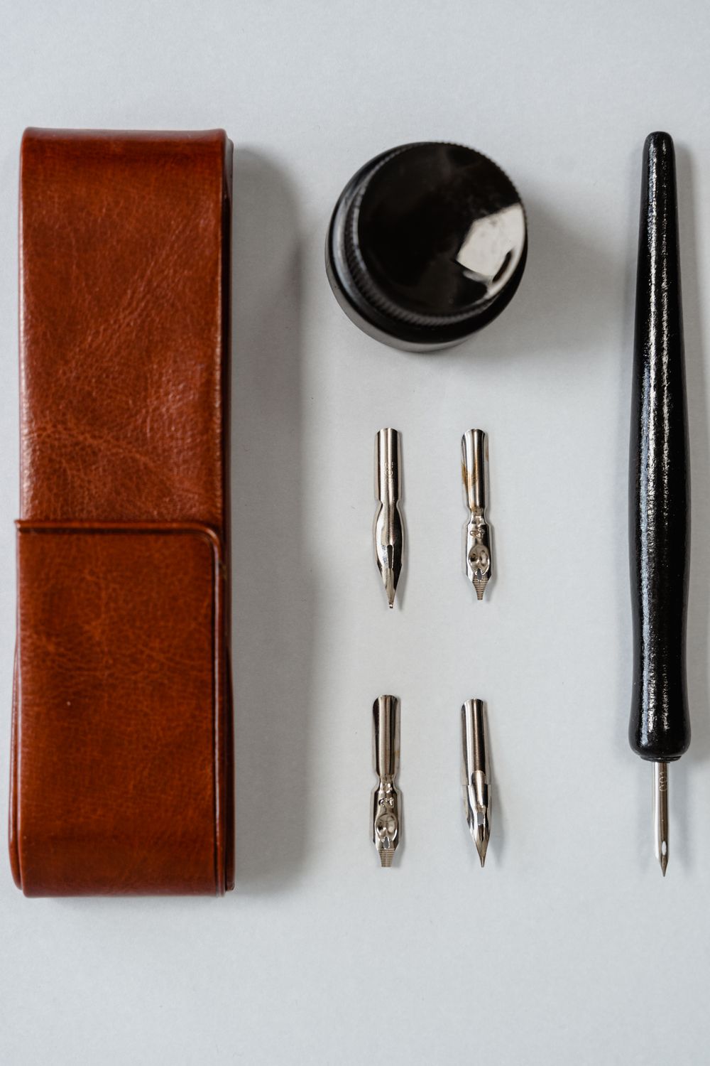 Leather case, ink bottle and pen writing set