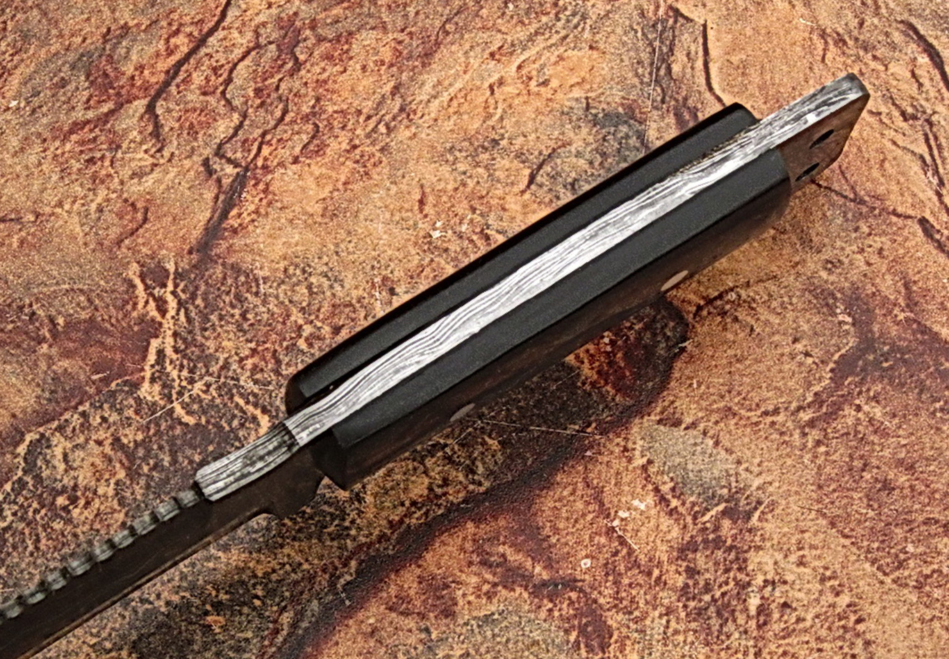 Damascus steel Tracker