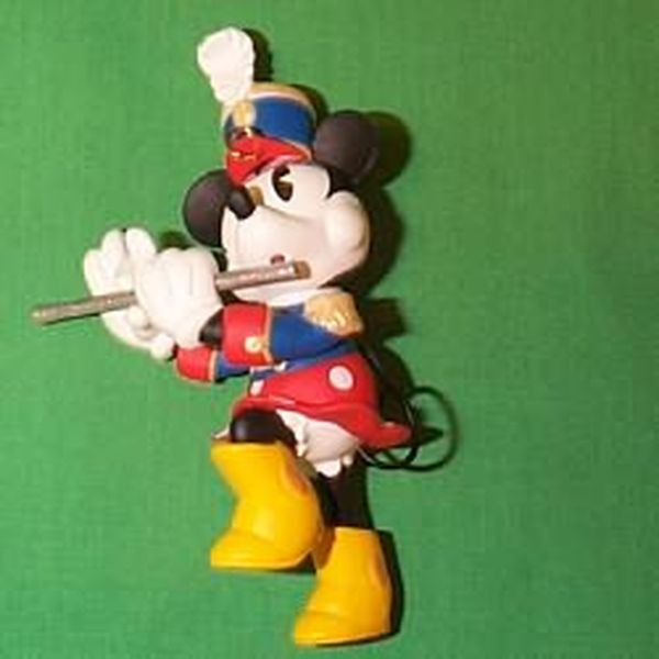 Minnie Plays the Flute