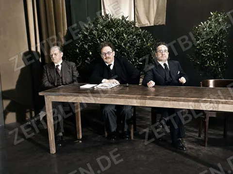 Drei Podiumsgäste der Bauernkundgebung in der Jubilee-Hall