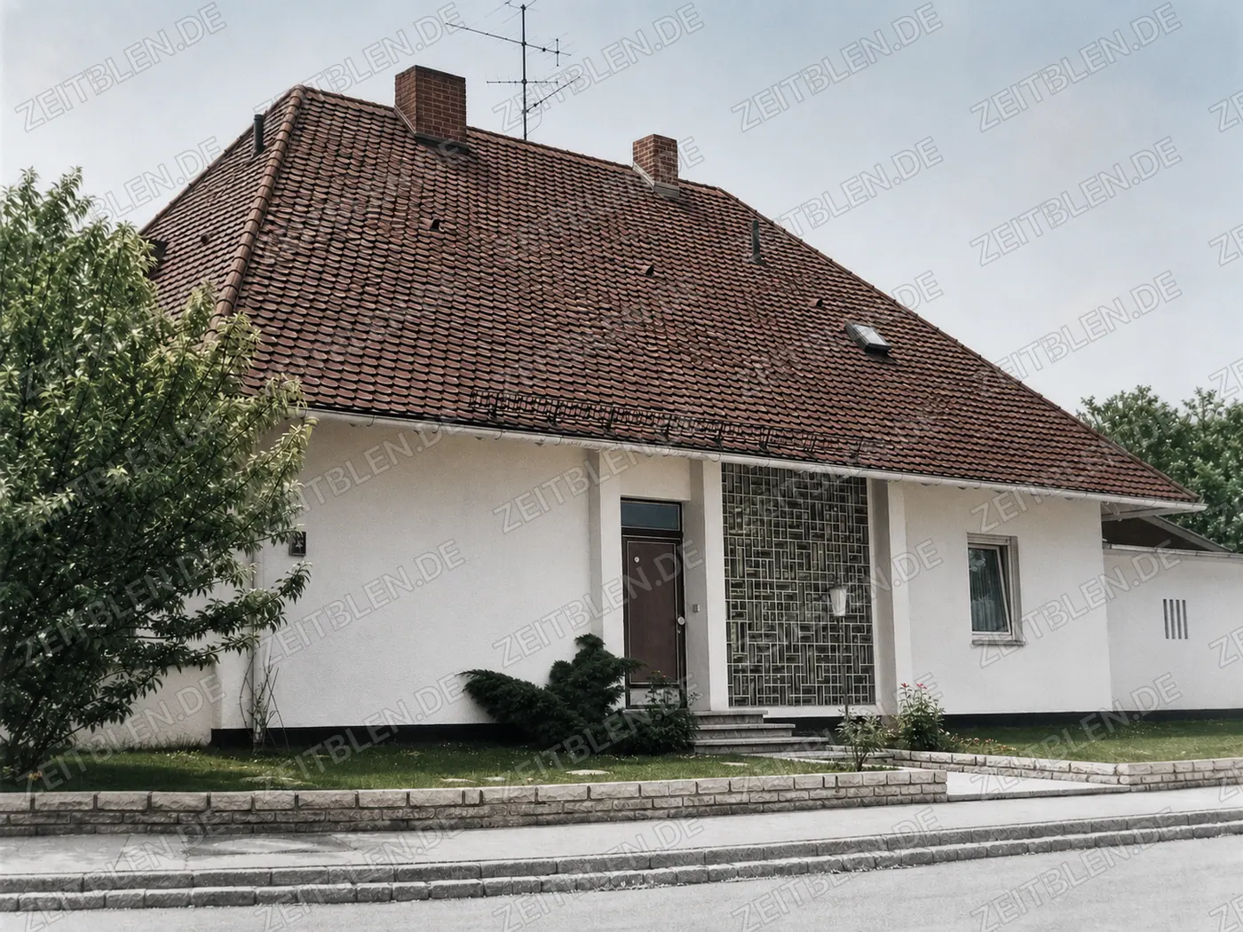 Wohnhaus am Münchner Stadtrand mit moderner Fensterfront
