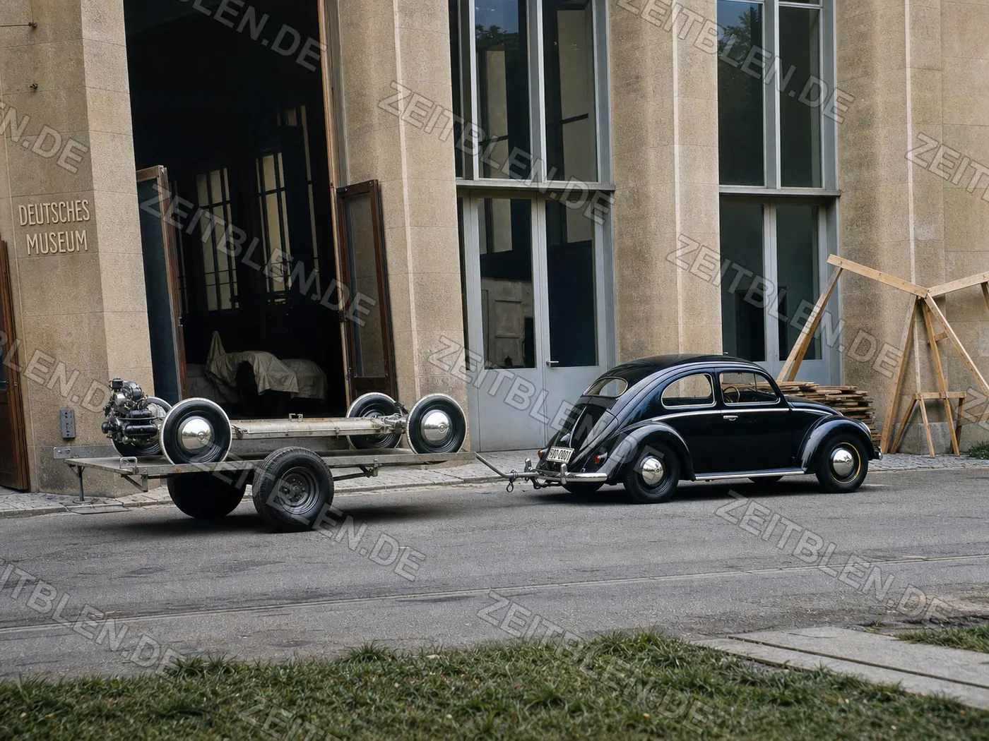 VW Käfer mit offenem Fahrgestell auf Anhänger