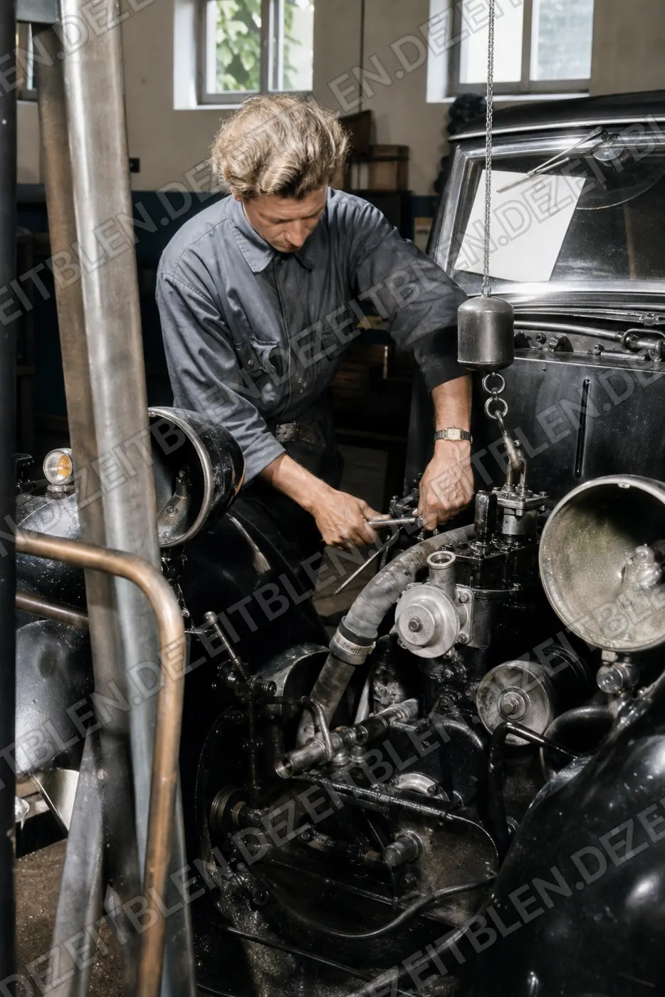 Mechanikerarbeit an Fahrzeugtechnik bei Auto-Henne