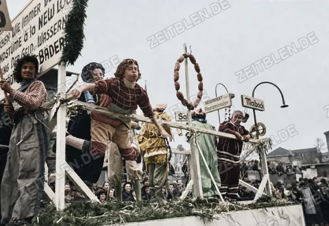 Satirischer Festwagen mit „Reserviert Finanzminister“ beim Faschingsumzug, 27. Februar 1949