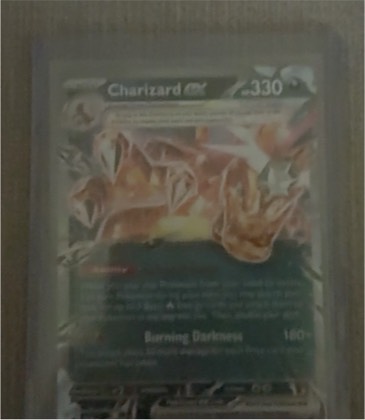 Charizard ex, graded 9.0