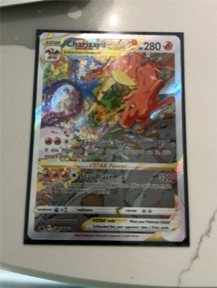 Charizard VSTAR, graded 9.0