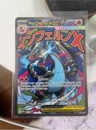 Mega Charizard X EX, graded 8.5